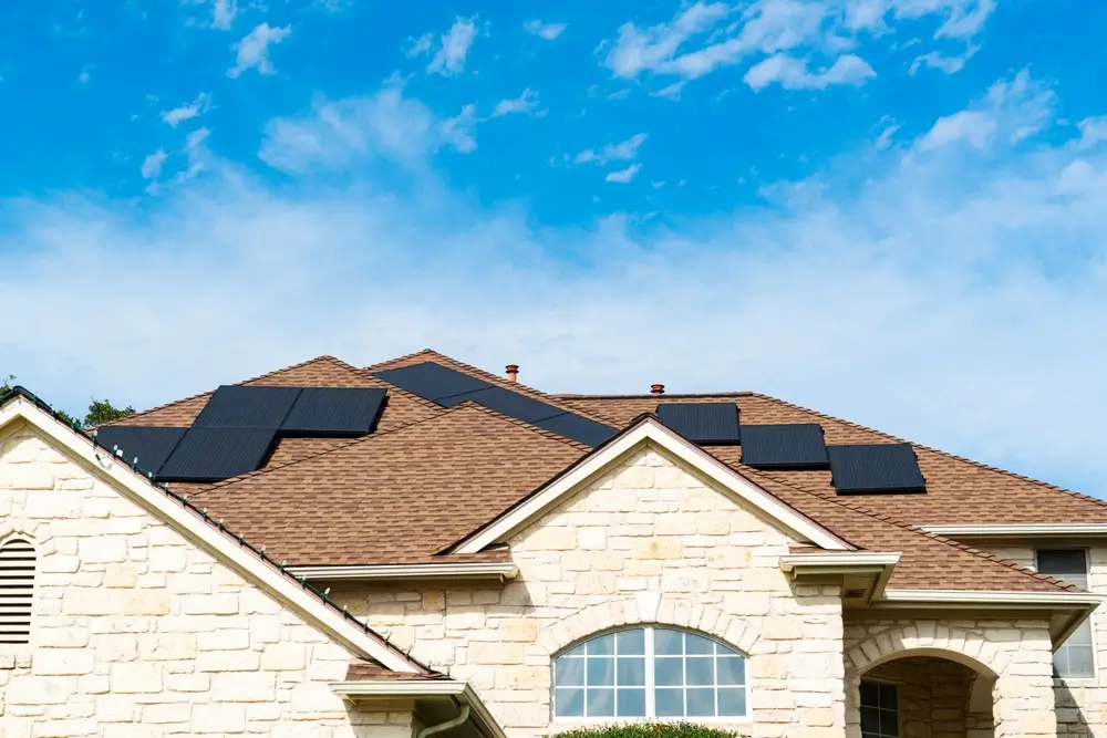 Rooftop Solar Panels on nice new home in Texas providing clean sustainable and renewable energy